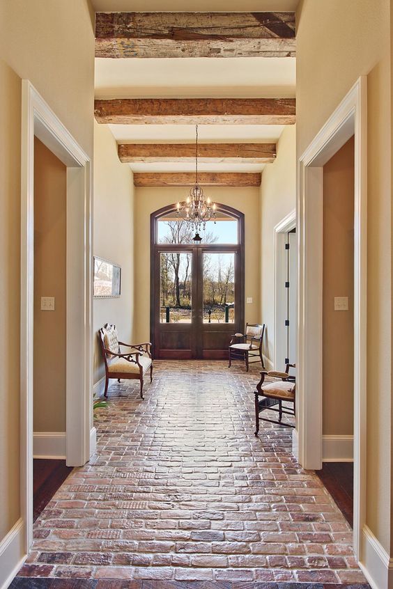 beautiful entance & hallway, brick floor ~ Troyer Builders
