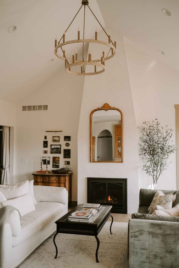 european living room with a tapered plaster fireplace