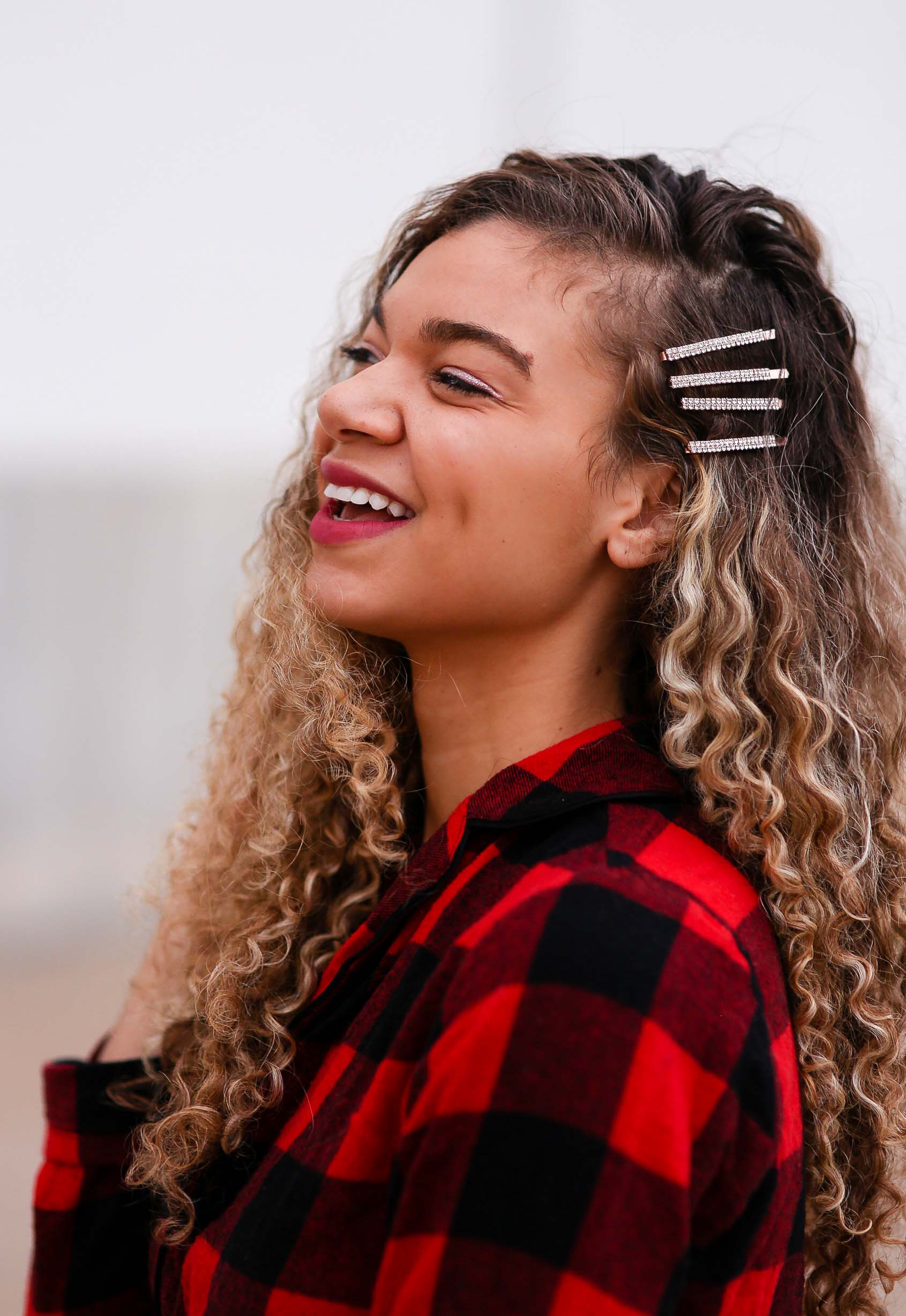 holiday outfits featuring sequin pants and a buffalo plaid shirt