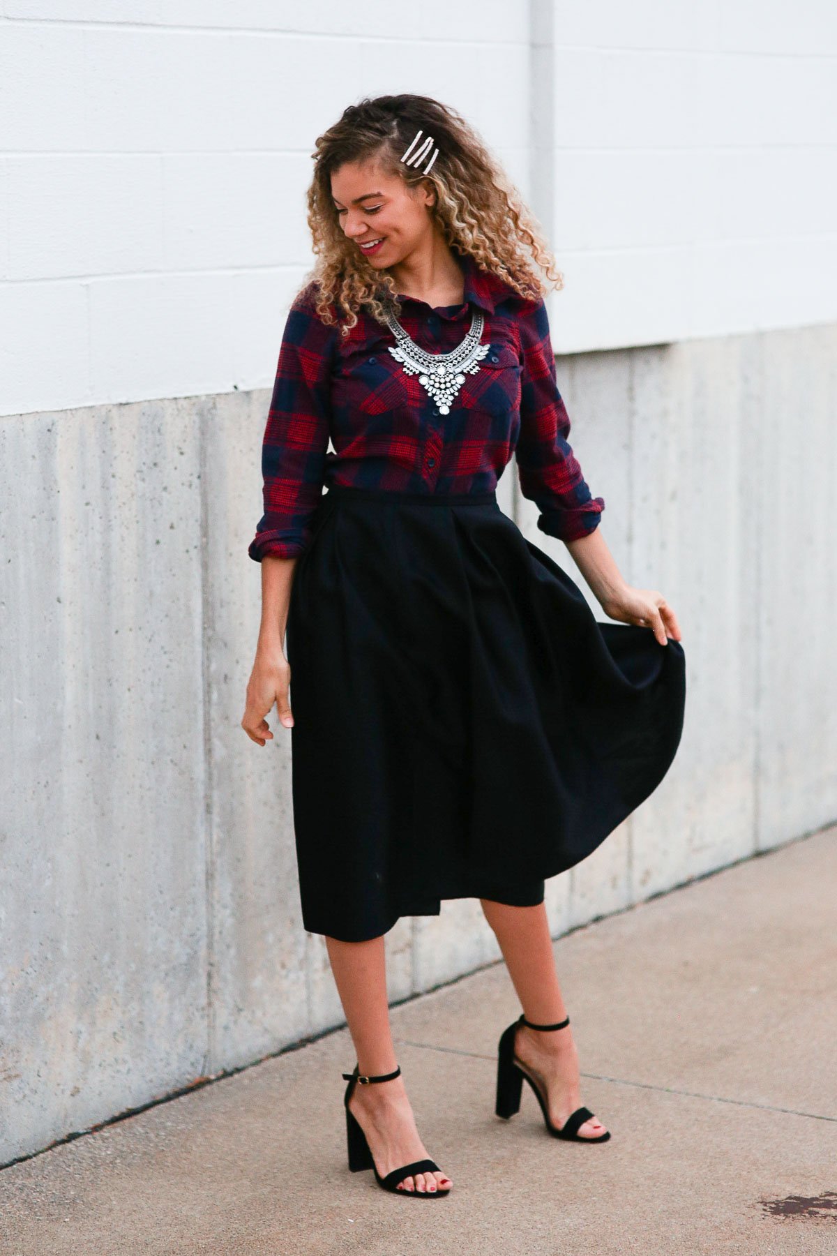 holiday outfits featuring a high waist skirt, plaid shirt, and faux fur