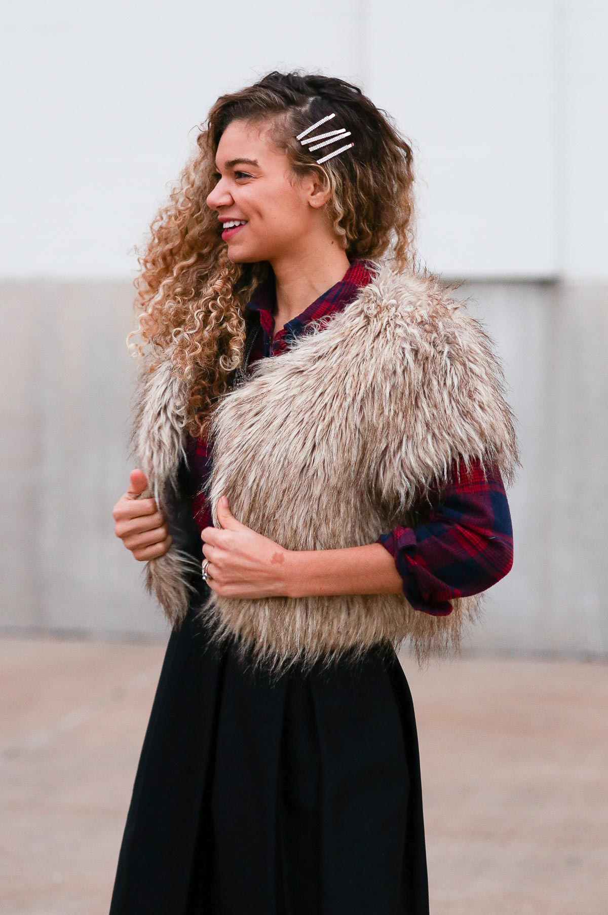 holiday outfits featuring a high waist skirt, plaid shirt, and faux fur