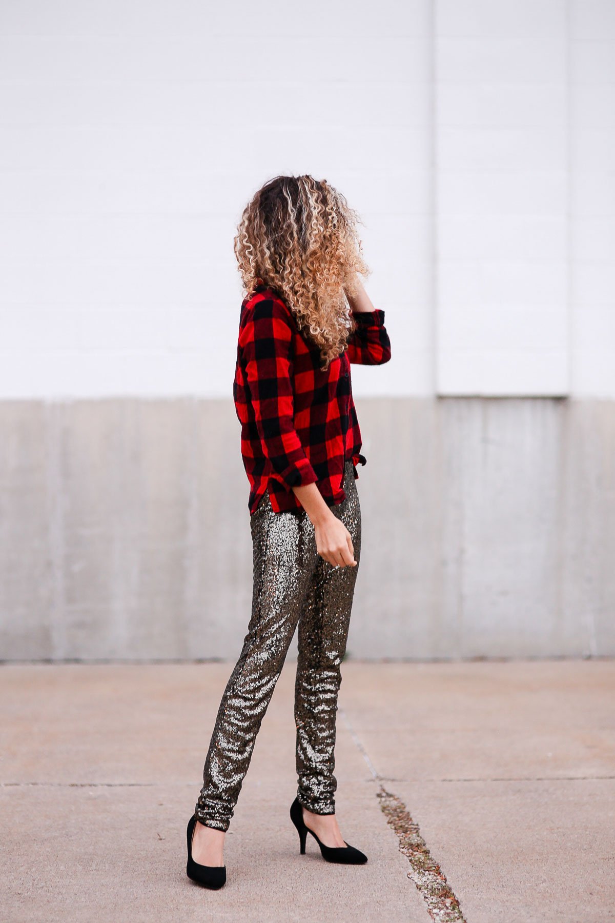 holiday outfits featuring sequin pants and a buffalo plaid shirt