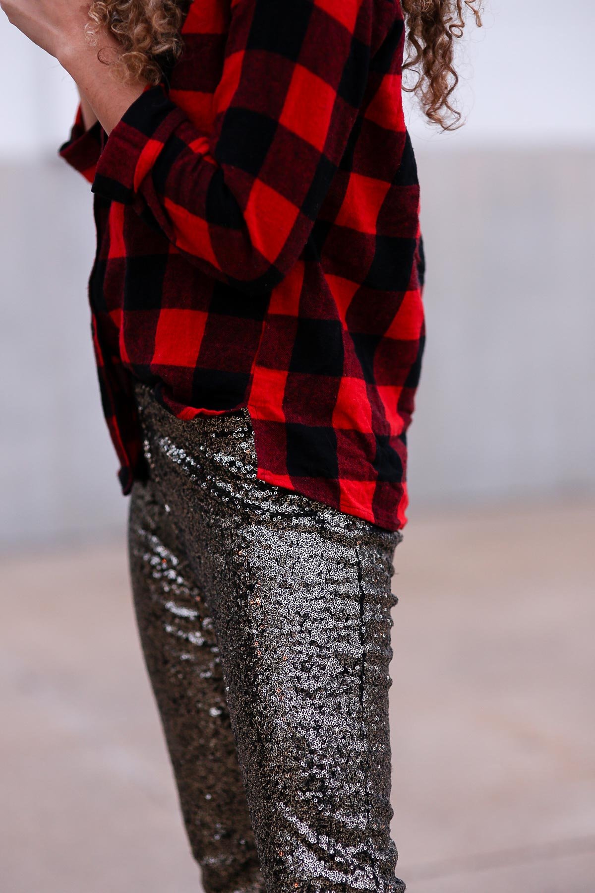 holiday outfits featuring sequin pants and a buffalo plaid shirt