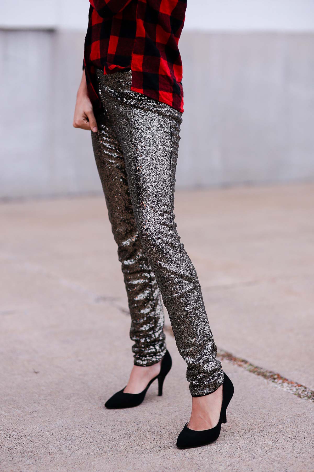 holiday outfits featuring sequin pants and a buffalo plaid shirt