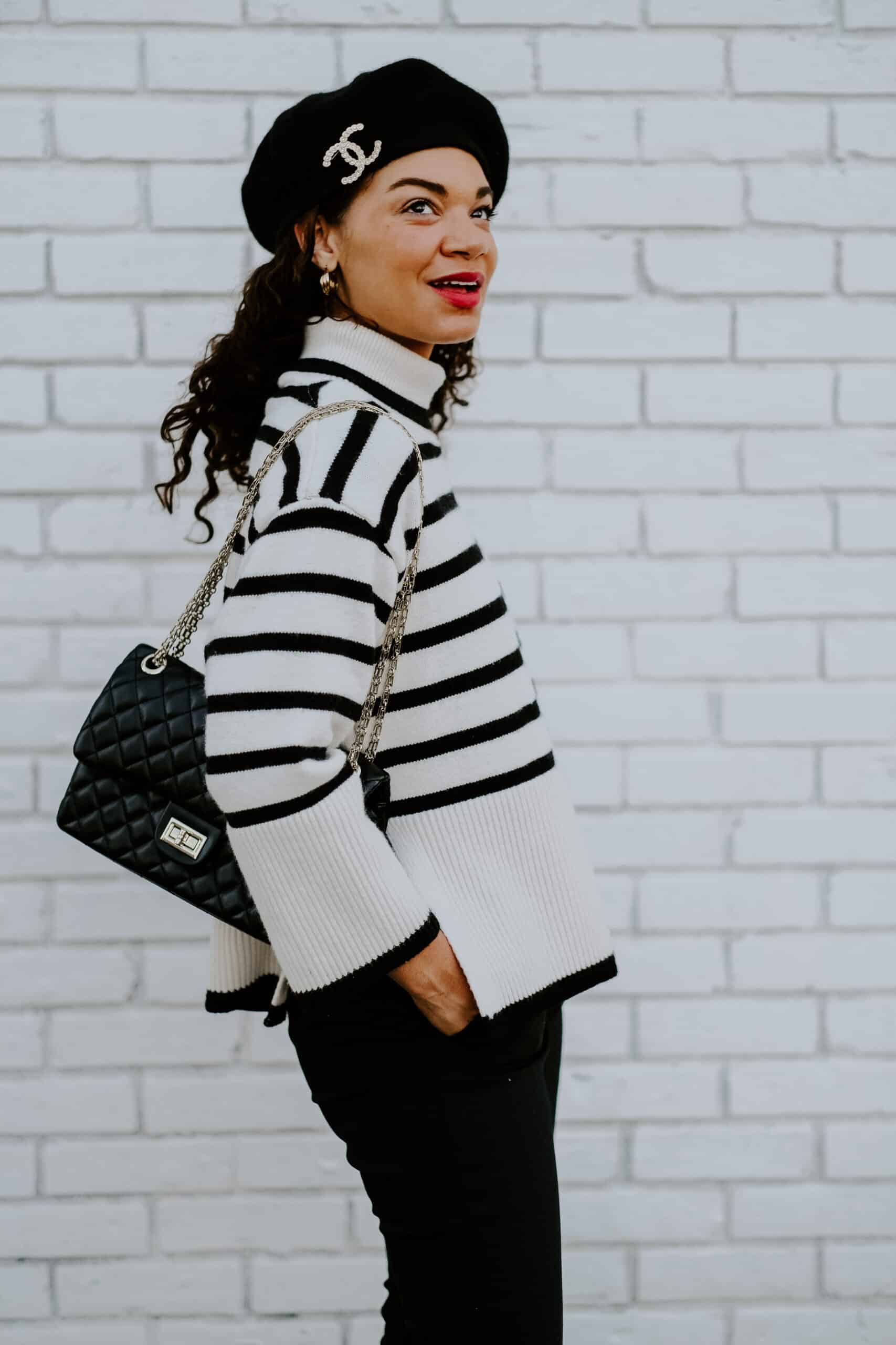 striped sweater and brooch outfit