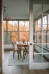 dining room sunroom combo with French doors